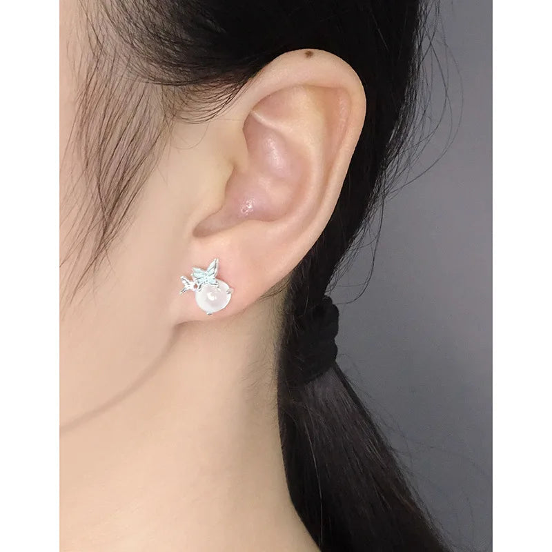 100% 925 Sterling Silver Simple and versatile light blue drop glue butterfly white agate earrings Korean version jewelry